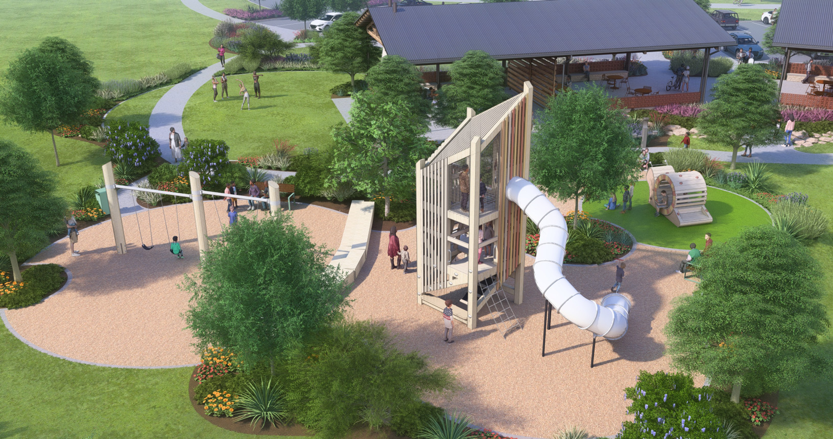 A modern playground with climbing structures, slides, and nearby picnic pavilion in a park.