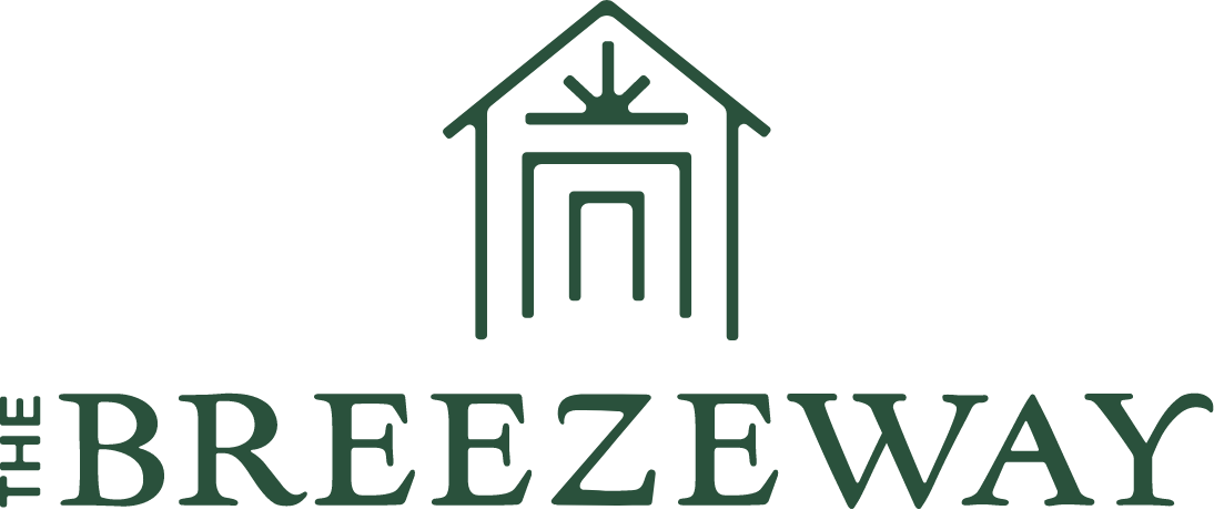Logo with a green house-like design above the text THE BREEZEWAY in capital letters.